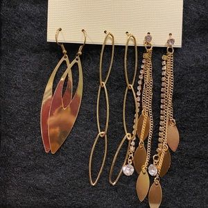 3 pairs of golden earrings